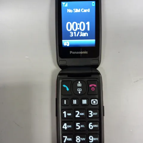 BOXED PANASONIC KX-TU446 FLIP MOBILE PHONE 
