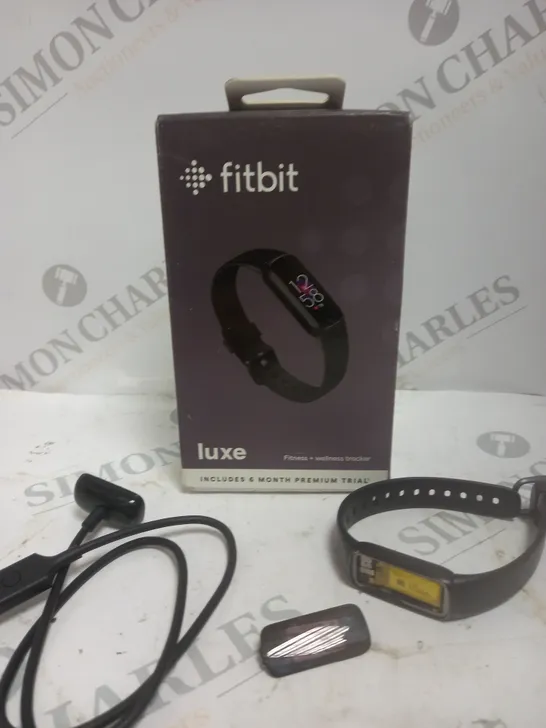 BOXED FITBIT LUXE FITNESS & WELLNESS TRACKER 