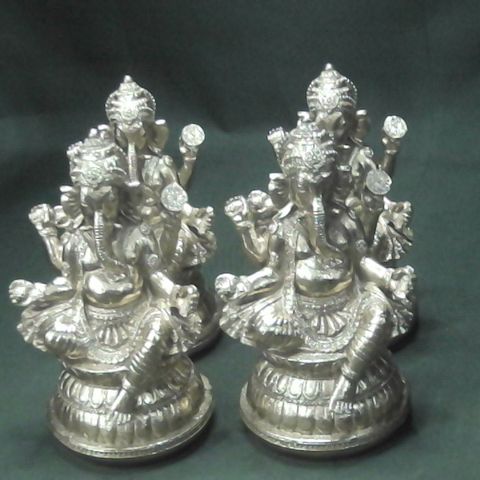 BOXED AS NEW LOT OF 4 GANESH GARDEN ORNAMENTS IN GOLD