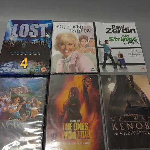 BOX OF APPROXIMATELY 15 DVDS TO INCLUDE - PAUL ZERDIN NO STRINGS , LOST 4 , STAR WARS OBI WAN KENOBI ETC