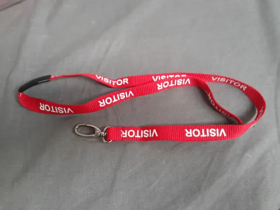 LOT OF APPROXIMATELY 900 RED VISITOR BRANDED LANYARDS