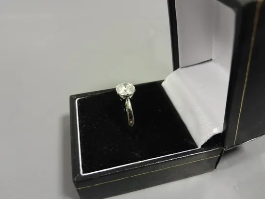 18CT GOLD SOLITAIRE RING SET WITH A NATURAL DIAMOND WEIGHING +-1.23CT