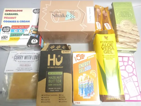 LOT OF ASSORTED FOOD ITEMS TO INCLUDE CHOCOLATE SHAKE SACHETS, HU CHOCOLATE BARS AND OLEO VERA GEL