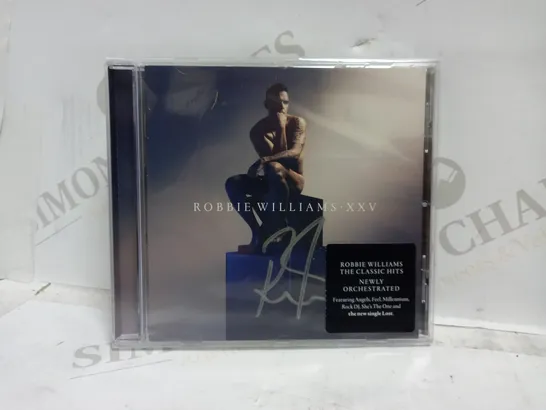 ROBBIE WILLIAMS XXV SIGNED ALBUM