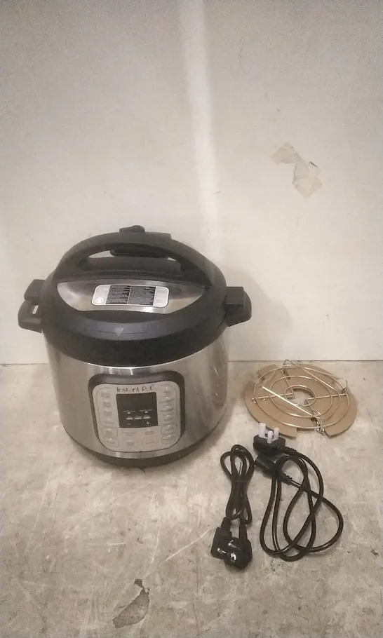 BOXED INSTANT POT MULTI USE PRESSURE COOKER 