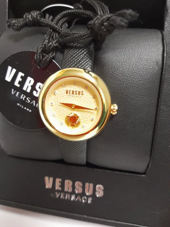 VERSUS VERSACE GOLD WRISTWATCH WITH BLACK STRAP DETAIL RRP £130