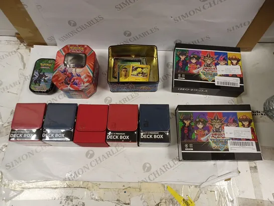 LOT OF ASSORTED CARD GAME GOODS TO INCLUDE VAULT X PREMIUM DECK BOX, YU-GI-OH LEGACY OF THE DUELIST BOX SET, AND POKEMON CARD CONTAINER ETC.