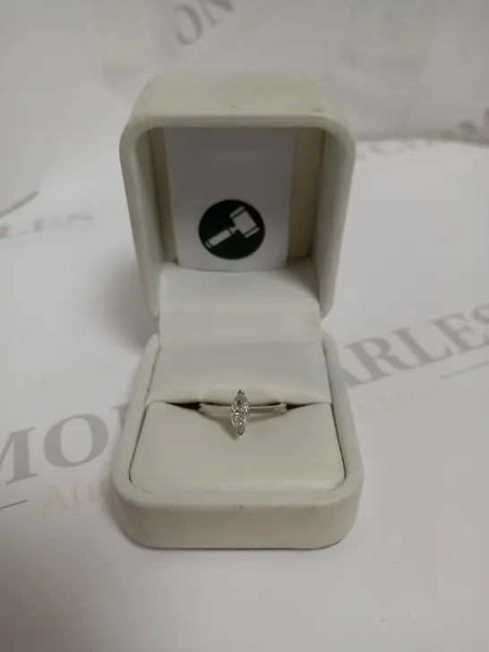 DESIGNER 18CT WHITE GOLD RING SET WITH A MARQUISE CUT DIAMOND WEIGHNG +-0.50CT