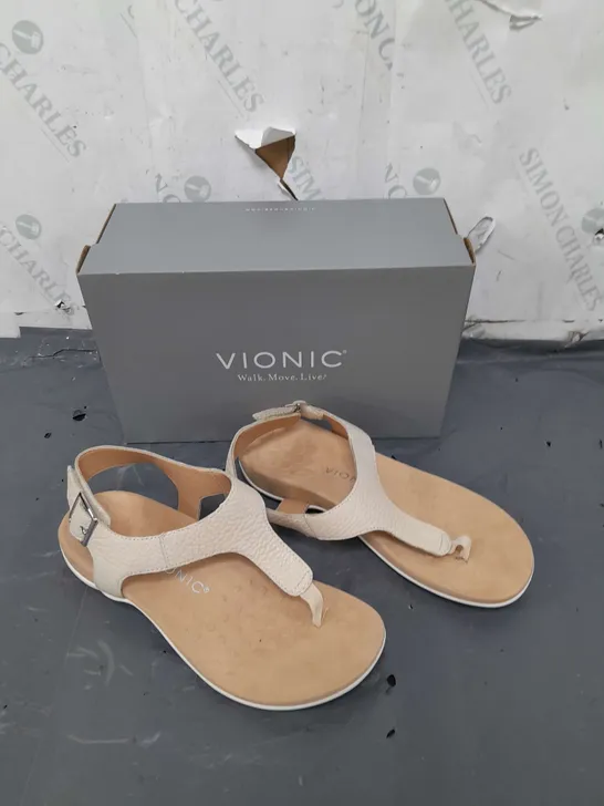 BOXED PAIR OF VIONIC WHITE SANDALS IN SIZE 6