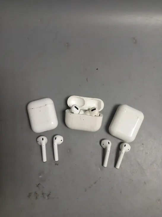 LOT OF 3 APPLE AIRPODS IN WHITE