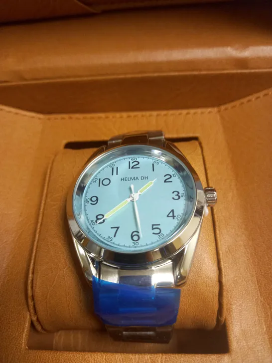 BOXED HELMA DH WATCH WITH PALE BLUE FACE IN SILVER