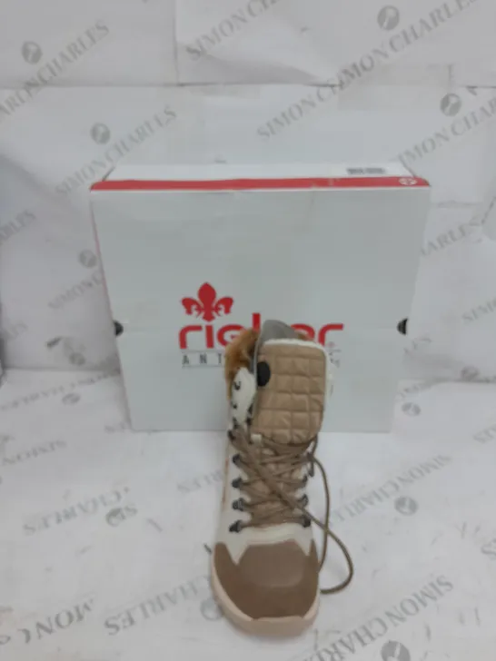 BOXED PAIR OF RIEKER CREAM WINTER FUR HIKE BOOTS IN SIZE 5 