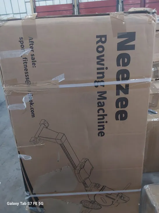 BOXED  EEZEE ROWING MACHINE 