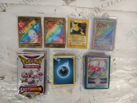 LOT OF ASSORTED POKÉMON TRADING CARDS AND BOOSTER PACKS