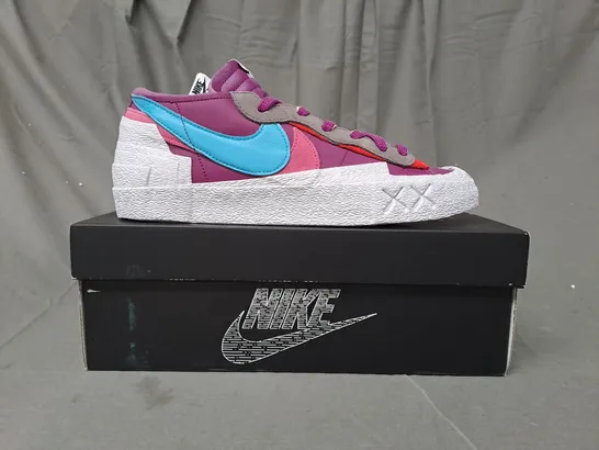 BOXED PAIR OF NIKE BLAZER LOW/SACAI/KAWS SHOES IN PURPLE/BLUE/PINK/WHITE UK SIZE 10