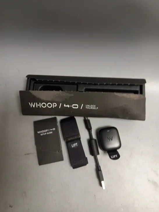 BOXED WHOOP WEARABLE FITNESS TRACKER IN BLACK