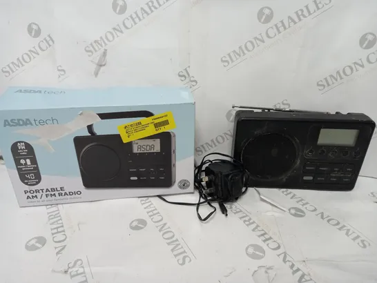 BOXED PORTABLE AM/FM RADIO IN BLACK