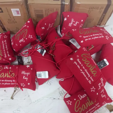 LOT OF APPROXIMATELY 30 BRAND NEW DEAR SANTA MAGIC KEY HANGING TEE DECORATIONS