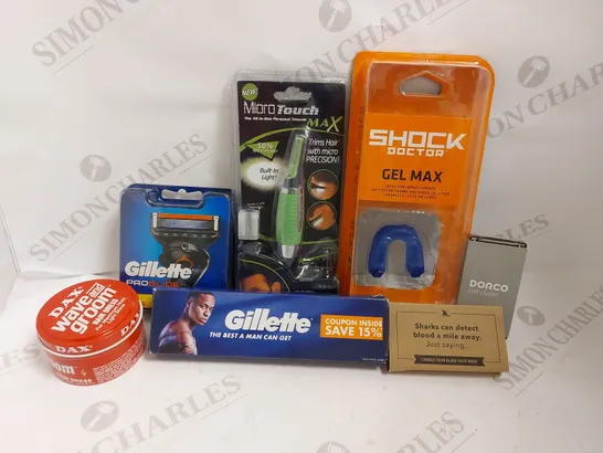 BOX OF APPROX 20 MALE COSMETIC ITEMS TO INCLUDE ASSORTED BLADES FOR RAZORS, MICROTOUCHMAX AND SHOCK DOCTOR GEL MAX MOUTHGUARD