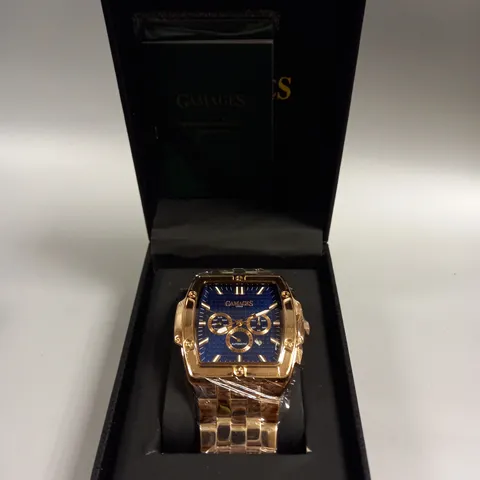 BOXED GAMAGES MAGNITUDE ROSE GOLD COLOUR BLUE DIAL WATCH 