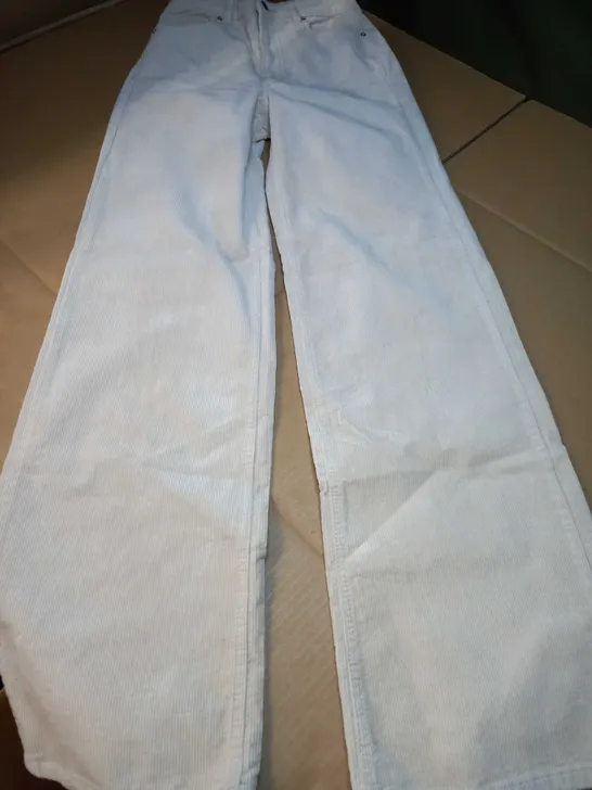 DIVIDED CREAM CORD TROUSERS - SIZE 6