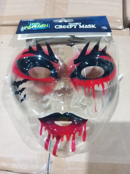 SIX BOXES OF 12 BRAND NEW CLEARLY CREEPY MASKS