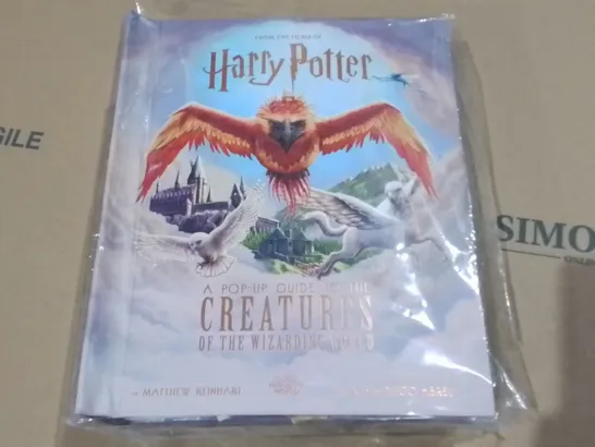 LOT OF 5 BRAND NEW HARRY POTTER POP UP CREATURE GUIDES