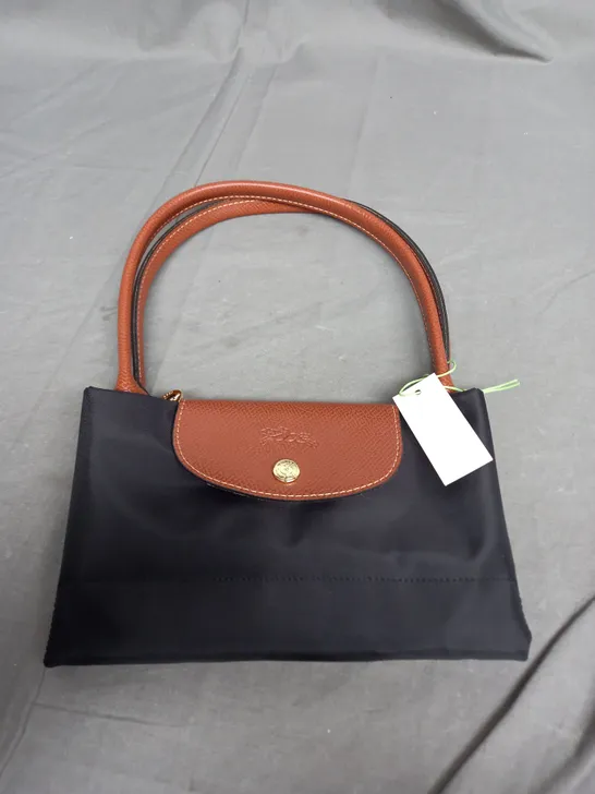 LONGCHAMP BLACK FOLD OUT HAND BAG