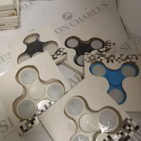 LOT OF APPROX 5 RANDOM COLOURED HAND SPINNERS