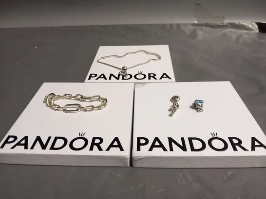 FOUR ASSORTED PANDORA PRODUCTS TO INCLUDE; BRACELTS AND CHARMS