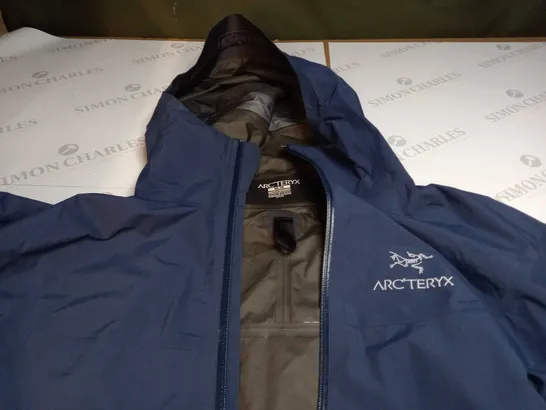 ARCTERYX GORE-TEX NAVY COAT IN MEDIUM