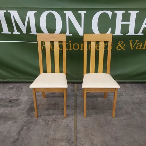 SET OF 2 DESIGNER DINING CHAIRS WITH IVORY SEAT PADS