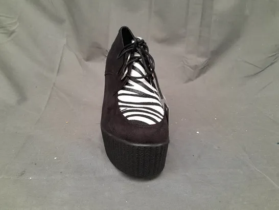 BOX OF APPROXIMATELY 10 BOXED PAIRS OF CASANDRA HIGH PLATFORM WEDGES IN BLACK/ZEBRA PRINT - VARIOUS SIZES