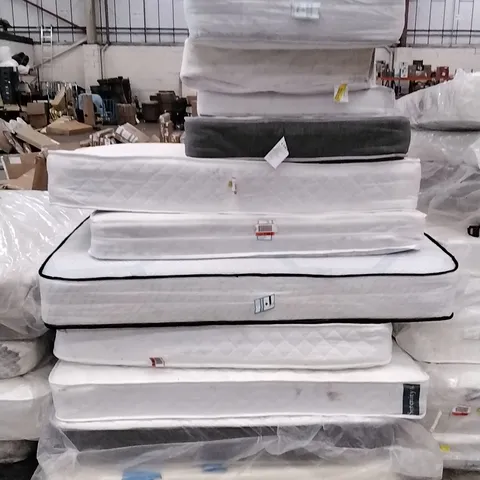 STACK OF APPROXIMATELY 11 QUALITY ASSORTED MATTRESSES