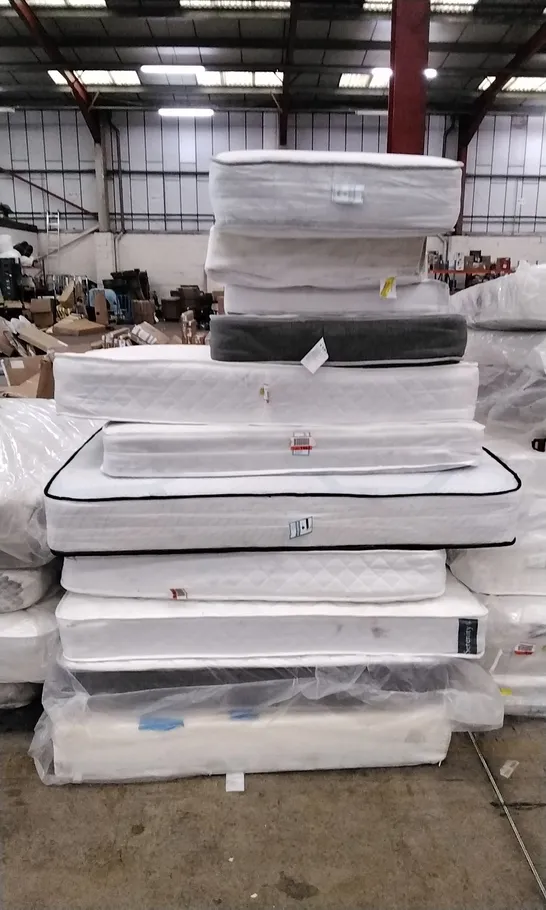 STACK OF APPROXIMATELY 11 QUALITY ASSORTED MATTRESSES