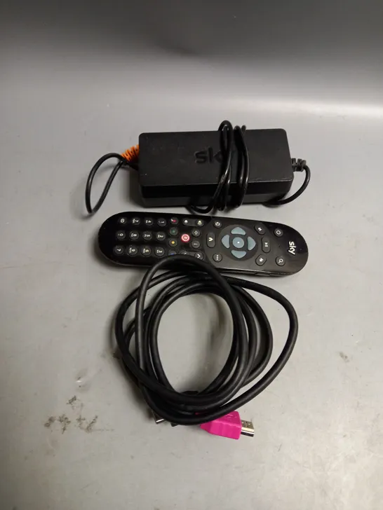 BOXED SKY REMOTE AND POWER SUPPLY