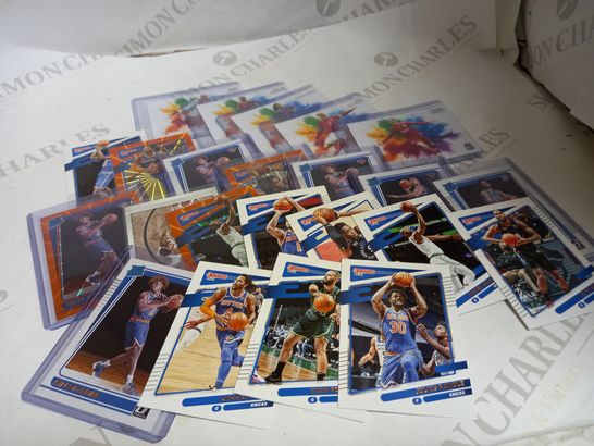 LOT OF APPROXIMATELY 23 BASKETBALL/FOOTBALL CARDS