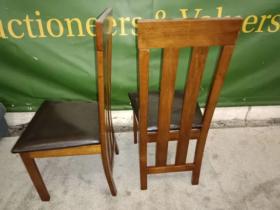 PAIR OF WOODEN DINING CHAIRS WITH BLACK FAUX LEATHER SEAT PADS 