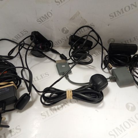 LOT OF ASSORTED ELECTRICAL ITEMS TO INCLUDE WEBCAMS AND AC ADAPTERS