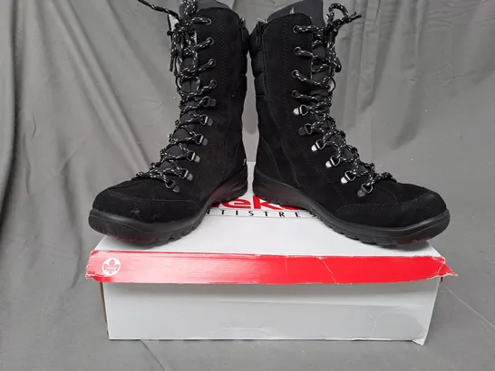 BOXED PAIR OF RIEKER SUEDE WATER RESISTANT BOOTS IN BLACK SIZE 5