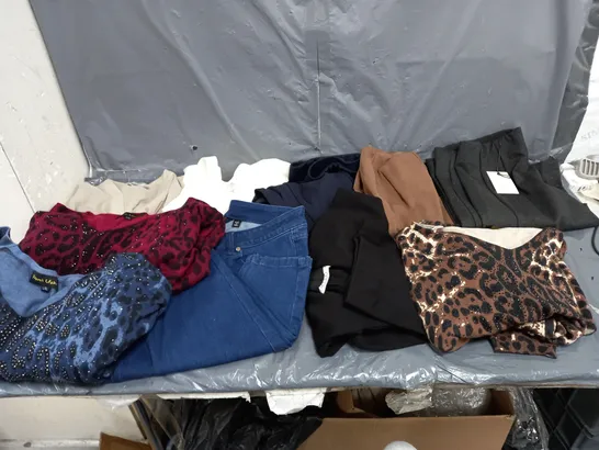 BOX OF APPROXIMATELY 10 ASSORTED PIECES OF CLOTHING IN VARIOUS STYLES, SIZES, AND BRANDS 