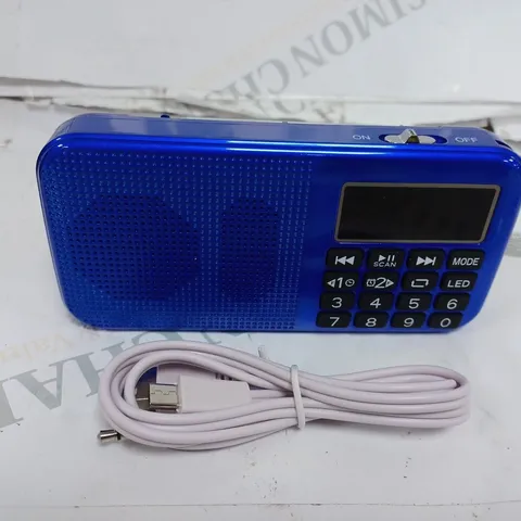 BOXED HANDHELD CLOCK RADIO 