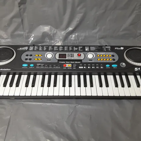 BOXED ACADEMY OF MUSIC ELECTRIC KEYBOARD