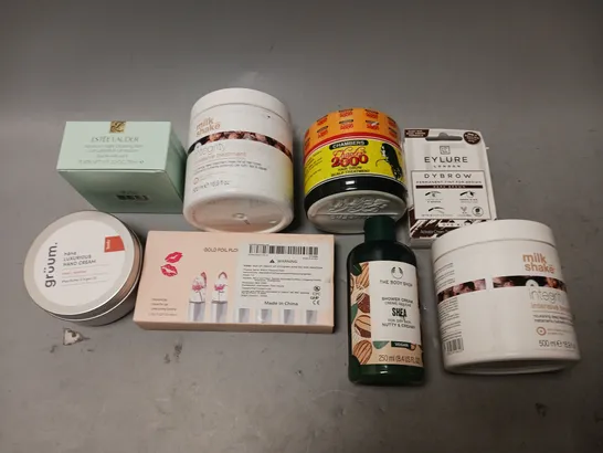 BOX OF APPROXIMATELY 15 COSMETIC ITEMS TO INCLUDE BODY SHOP SHOWER CREAM, EYLURE DYBROW, AND GRUUM HAND CREAM ETC.