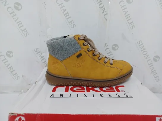 BOXED PAIR OF RIEKER LACE UP WATER RESISTANT BOOTS IN YELLOW SIZE 4