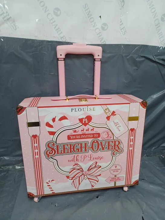 PLOUISE SLEIGH OVER SUITCASE IN PINK