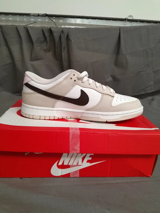 BOXED PAIR OF NIKE DUNKS LOW SIZE 7