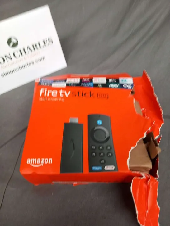 BOXED AMAZON FIRE TV STICK LITE