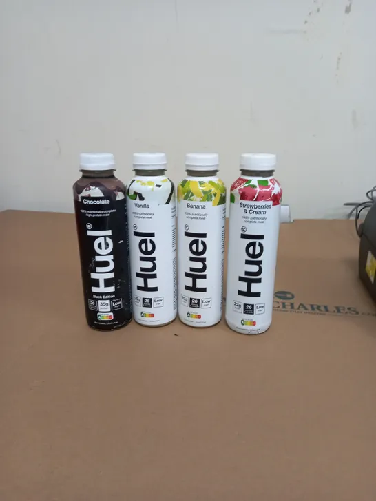 APPROXIMATELY 15 HUEL COMPLETE MEAL DRINKS ASSORTED FLAVOURS 500ML