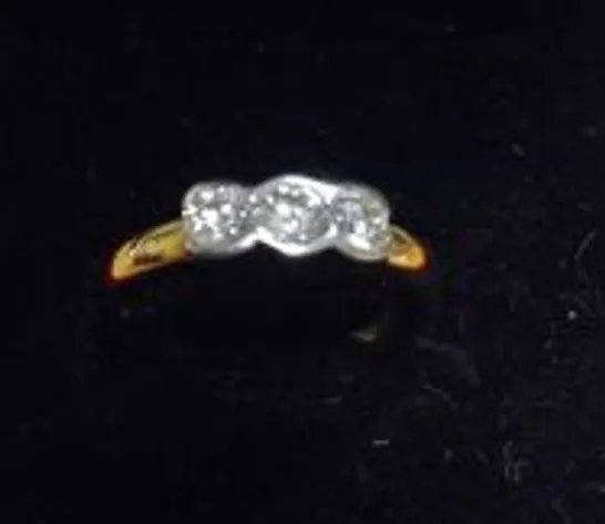 18CT GOLD THREE STONE RING SET WITH NATURAL DIAMONDS